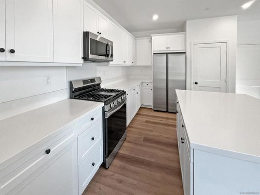 Interior, Kitchen, Recessed Lighting, Stainless Steel Appliances, Wood Texture Flooring