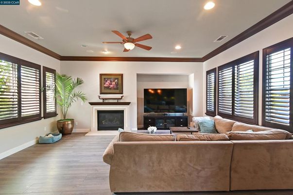 Fireplace, Interior, Living room, Recessed Lighting, Wood Texture Flooring