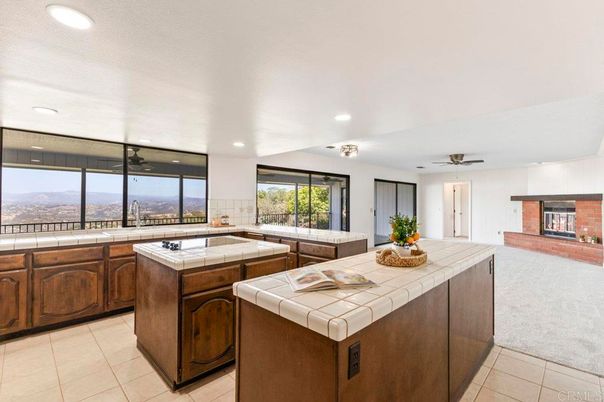 Fireplace, Interior, Kitchen, Recessed Lighting, Tile Countertops