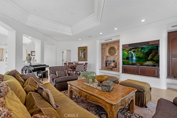 Dining room, Fireplace, Interior, Living room, Piano, Recessed Lighting, Wood Texture Flooring