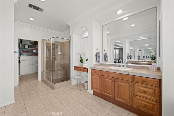 Bathroom, Dual Sink Vanities, Glass Shower, Interior, Recessed Lighting, Tile Countertops