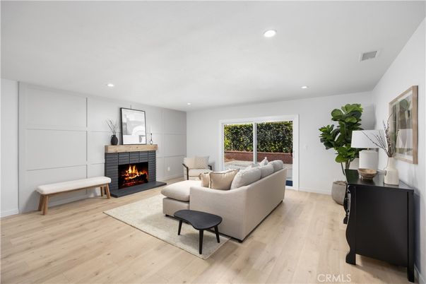 Fireplace, Interior, Living room, Recessed Lighting, Wood Texture Flooring