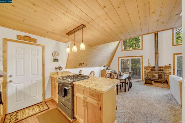 Dining room, Fireplace, Interior, Kitchen, Pendant Lights, Wooden Ceilings, Wood Texture Flooring