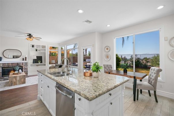 Dining room, Fireplace, Interior, Kitchen, Recessed Lighting, Wood Texture Flooring