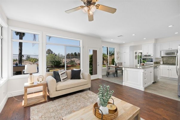 Dining room, Interior, Kitchen, Living room, Recessed Lighting, Stainless Steel Appliances, Wood Texture Flooring