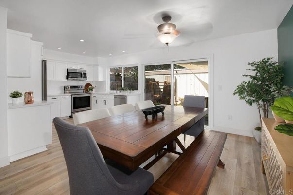 Dining room, Interior, Kitchen, Recessed Lighting, Stainless Steel Appliances, Wood Texture Flooring