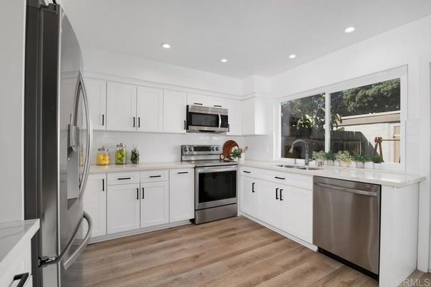 Interior, Kitchen, Recessed Lighting, Stainless Steel Appliances, Wood Texture Flooring