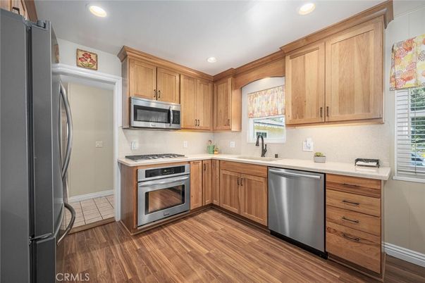 Interior, Kitchen, Recessed Lighting, Stainless Steel Appliances, Wood Texture Flooring