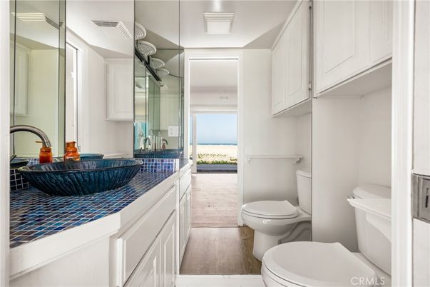 Bathroom, Interior, Tile Countertops, Water, Wood Texture Flooring