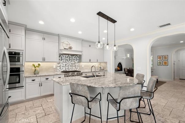 Fireplace, Interior, Kitchen, Pendant Lights, Recessed Lighting, Stainless Steel Appliances