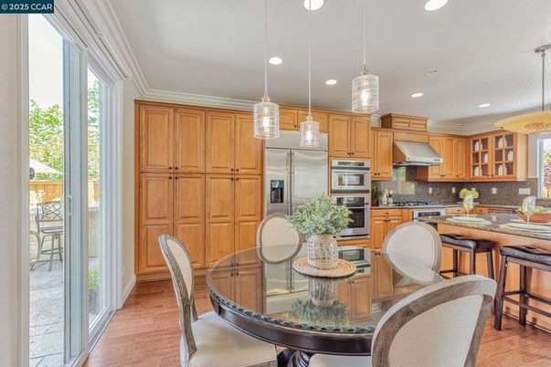 Dining room, Interior, Kitchen, Living room, Pendant Lights, Recessed Lighting, Stainless Steel Appliances, Wood Texture Flooring