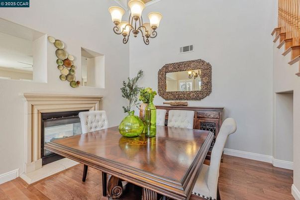 Chandelier, Fireplace, Interior, Living room, Recessed Lighting, Wood Texture Flooring