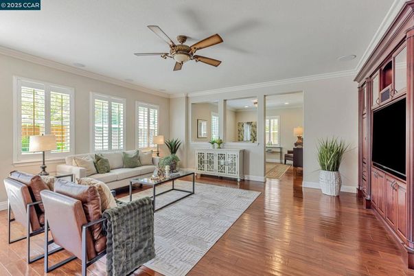 Dining room, Fireplace, Interior, Kitchen, Living room, Pendant Lights, Recessed Lighting, Stainless Steel Appliances, Wood Texture Flooring
