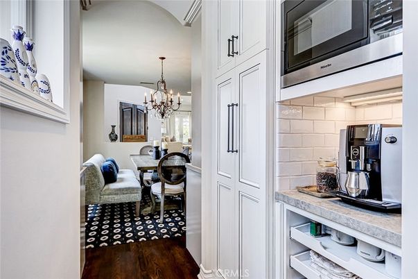 Chandelier, Dining room, Interior, Kitchen, Stainless Steel Appliances, Stone Walls, Wood Texture Flooring