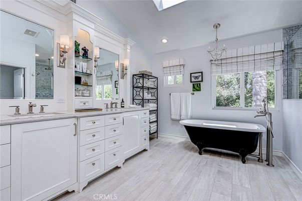 Bathroom, Chandelier, Dual Sink Vanities, Free Standing Baths, Interior, Recessed Lighting, Wood Texture Flooring