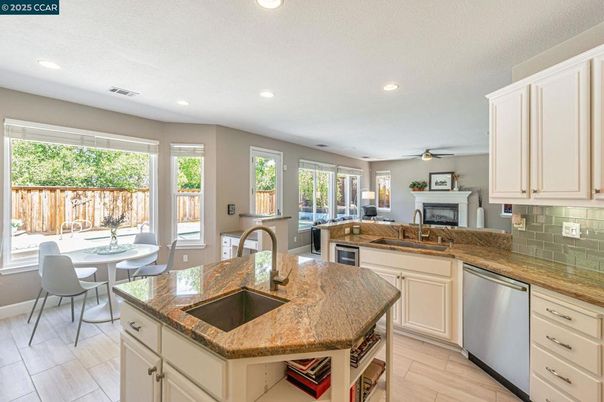 Dining room, Fireplace, Interior, Kitchen, Recessed Lighting, Stainless Steel Appliances