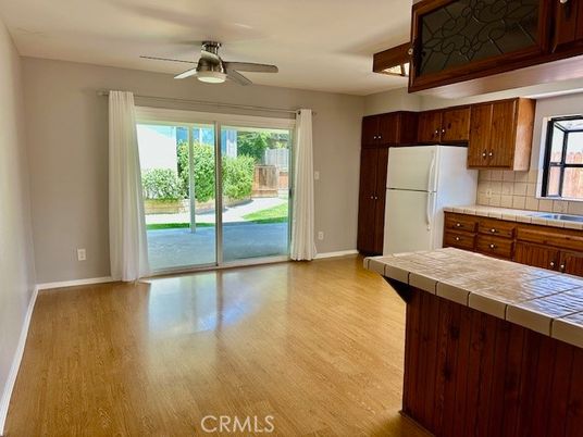 Empty room, Interior, Kitchen, Tile Countertops, Wood Texture Flooring