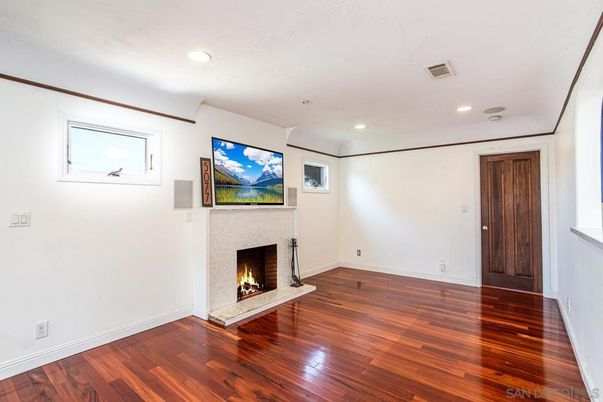 Empty room, Fireplace, Interior, Recessed Lighting, Wood Texture Flooring