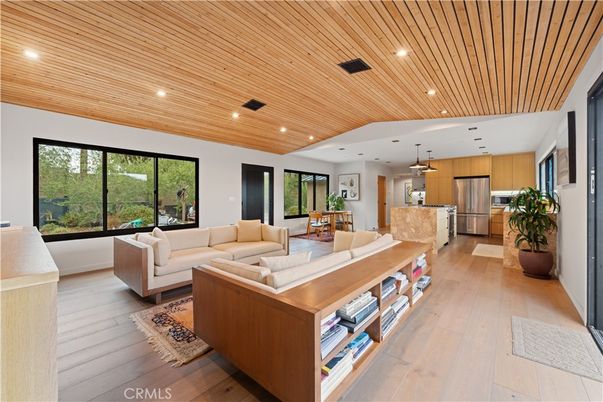 Dining room, Interior, Kitchen, Living room, Pendant Lights, Recessed Lighting, Stainless Steel Appliances, Wooden Ceilings, Wood Texture Flooring
