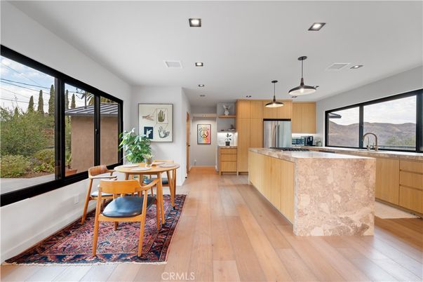 Dining room, Interior, Kitchen, Pendant Lights, Recessed Lighting, Stainless Steel Appliances, Wood Texture Flooring