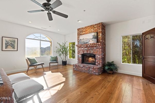 Fireplace, Interior, Recessed Lighting, Stone Walls, Wood Texture Flooring