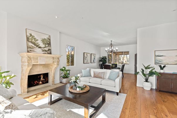 Chandelier, Dining room, Fireplace, Interior, Living room, Recessed Lighting, Wood Texture Flooring