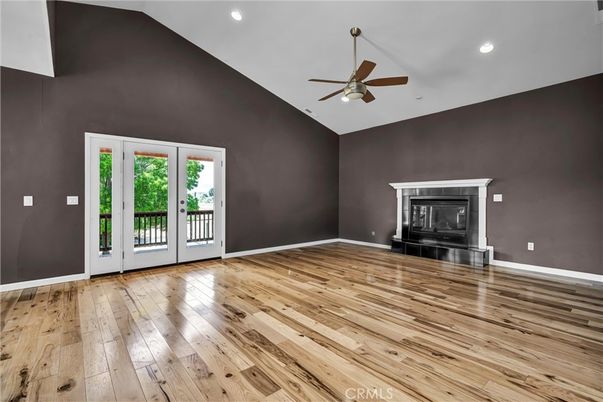 Empty room, Fireplace, Interior, Recessed Lighting, Wood Texture Flooring
