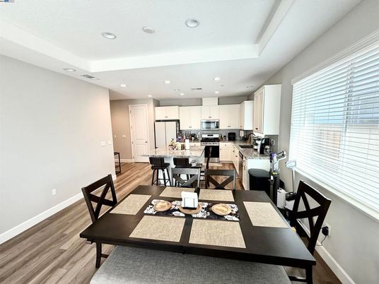 Dining room, Interior, Kitchen, Recessed Lighting, Stainless Steel Appliances, Wood Texture Flooring