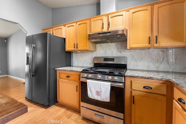 Interior, Kitchen, Marble Walls, Stainless Steel Appliances, Wood Texture Flooring