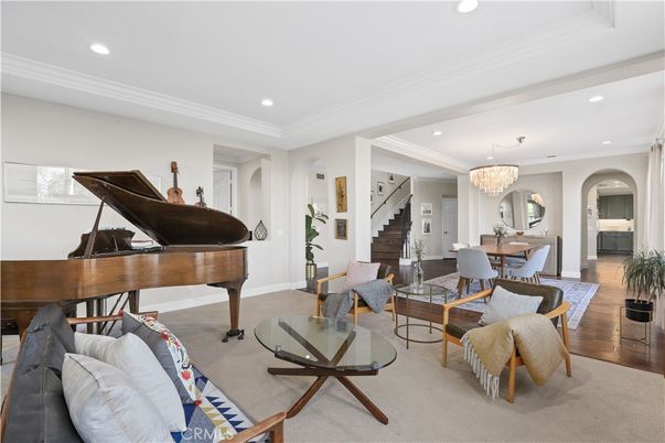 Chandelier, Dining room, Interior, Living room, Piano, Recessed Lighting, Wood Texture Flooring