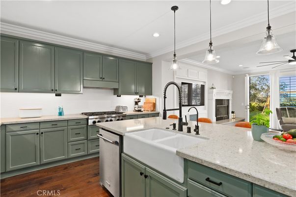 Fireplace, Interior, Kitchen, Pendant Lights, Recessed Lighting, Stainless Steel Appliances, Wood Texture Flooring