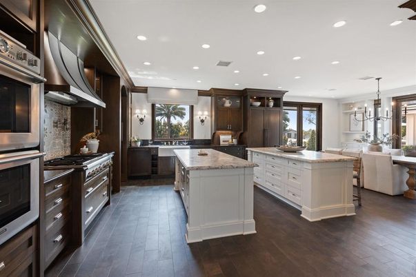 Chandelier, Dining room, Interior, Kitchen, Recessed Lighting, Stainless Steel Appliances, Wood Texture Flooring
