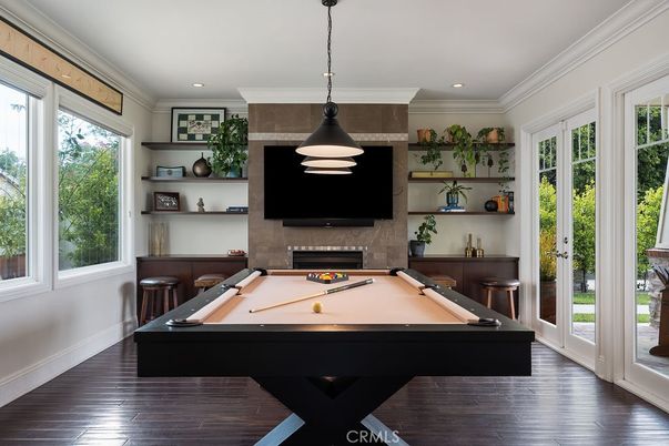 Billiard Table, Fireplace, Game Room, Interior, Pendant Lights, Recessed Lighting, Wood Texture Flooring