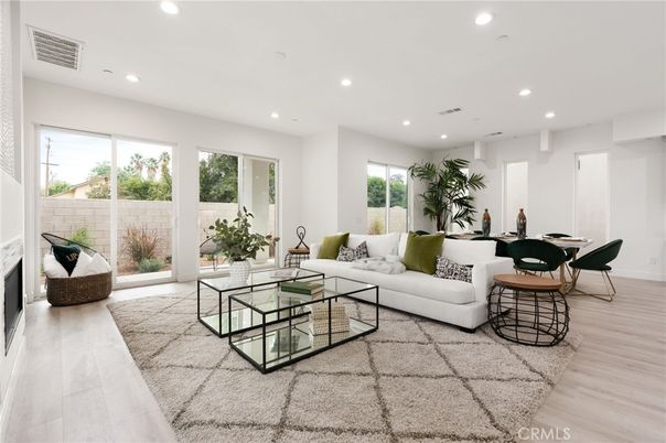 Dining room, Fireplace, Interior, Living room, Recessed Lighting, Wood Texture Flooring