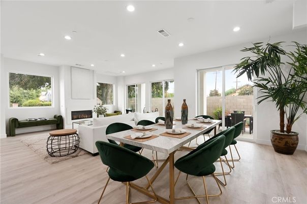 Dining room, Fireplace, Interior, Living room, Recessed Lighting, Wood Texture Flooring