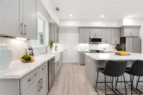 Interior, Kitchen, Recessed Lighting, Stainless Steel Appliances, Wood Texture Flooring