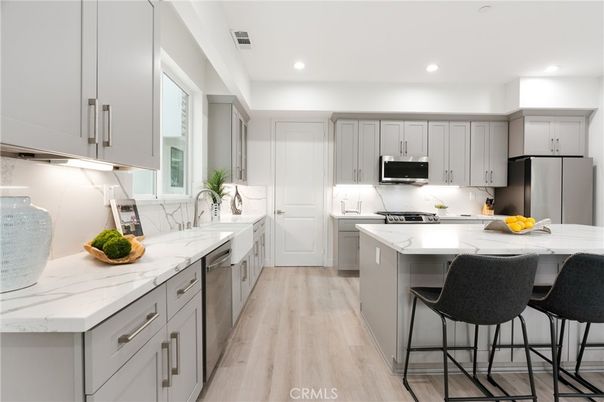Interior, Kitchen, Recessed Lighting, Stainless Steel Appliances, Wood Texture Flooring