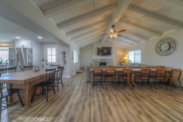 Dining room, Fireplace, Interior, Kitchen, Recessed Lighting, Wood Texture Flooring