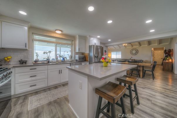 Dining room, Interior, Kitchen, Recessed Lighting, Stainless Steel Appliances, Wood Texture Flooring