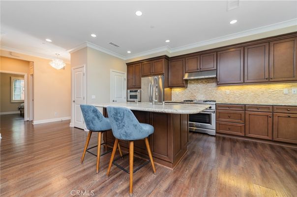 Chandelier, Interior, Kitchen, Recessed Lighting, Stainless Steel Appliances, Wood Texture Flooring