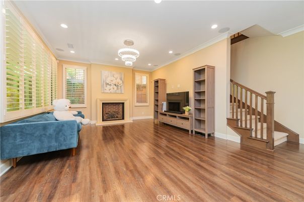 Chandelier, Fireplace, Interior, Recessed Lighting, Wood Texture Flooring