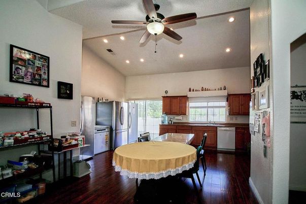 Dining room, Interior, Kitchen, Recessed Lighting, Stainless Steel Appliances, Wood Texture Flooring