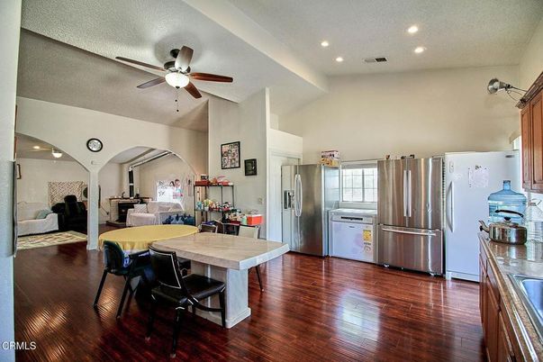 Dining room, Interior, Kitchen, Recessed Lighting, Stainless Steel Appliances, Wood Texture Flooring