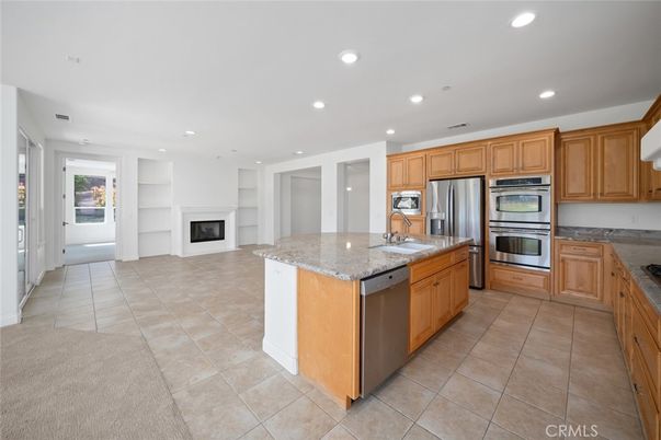 Fireplace, Interior, Kitchen, Recessed Lighting, Stainless Steel Appliances