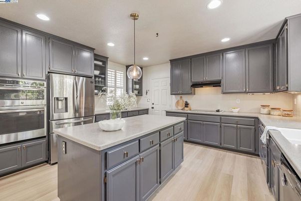 Interior, Kitchen, Pendant Lights, Recessed Lighting, Stainless Steel Appliances, Wood Texture Flooring