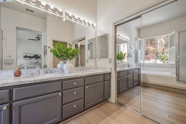 Bathroom, Dual Sink Vanities, Glass Shower, Interior, Wood Texture Flooring