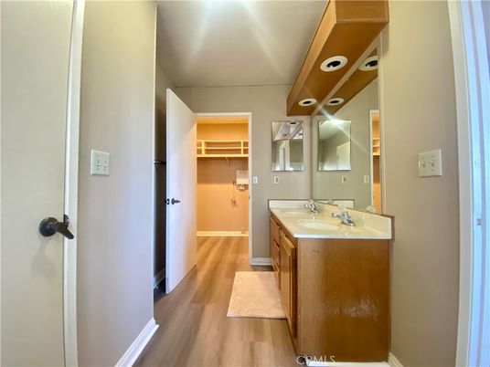 Bathroom, Dual Sink Vanities, Interior, Recessed Lighting, Wood Texture Flooring