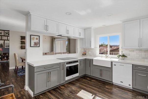 Dining room, Interior, Kitchen, Recessed Lighting, Stainless Steel Appliances, Wood Texture Flooring