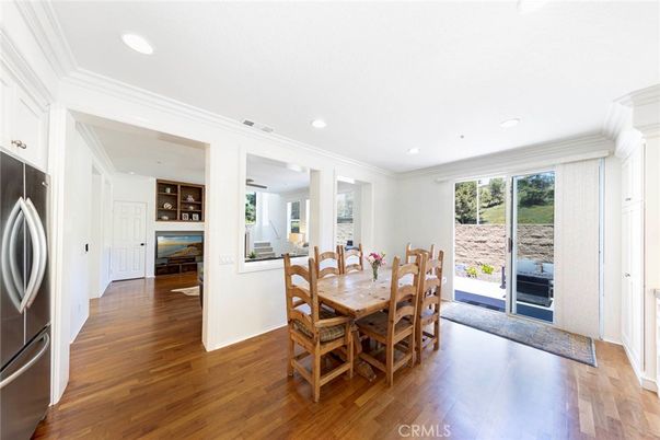 Dining room, Interior, Kitchen, Recessed Lighting, Stainless Steel Appliances, Wood Texture Flooring