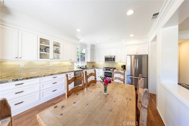 Dining room, Interior, Kitchen, Recessed Lighting, Stainless Steel Appliances, Wood Texture Flooring